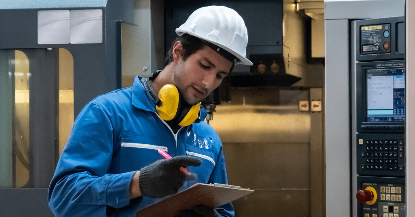 Multilingual employee reviewing training documents